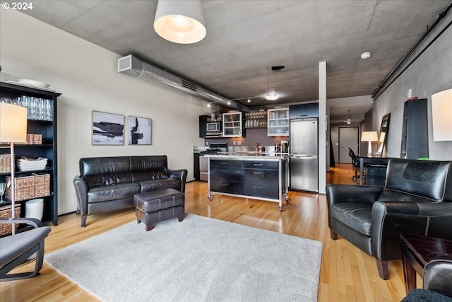 living room featuring light wood-type flooring