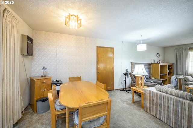 carpeted dining room with an AC wall unit and a textured ceiling