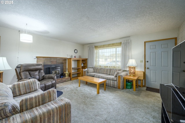 carpeted living room featuring a textured ceiling