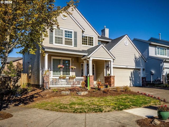 15337 SE Olds Dr, Clackamas, OR 97015 - view of front of home with covered porch, driveway, a chimney, a shingled roof, and a garage