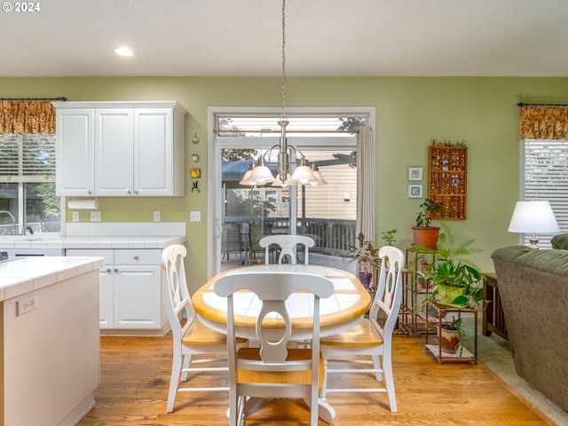 15337 SE Olds Dr, Clackamas, OR 97015 - dining space featuring a chandelier, healthy amount of natural light, light wood-type flooring, and recessed lighting