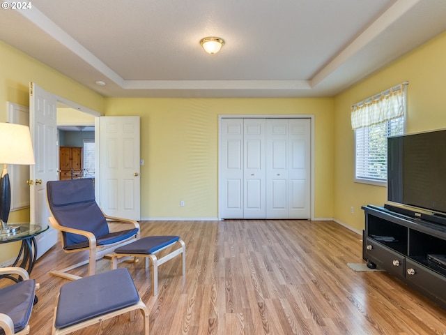 15337 SE Olds Dr, Clackamas, OR 97015 - sitting room with a tray ceiling, light wood finished floors, and baseboards