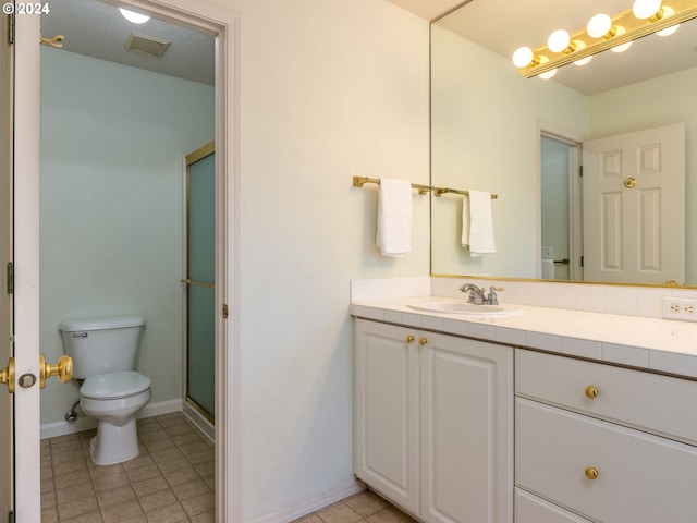 15337 SE Olds Dr, Clackamas, OR 97015 - full bath with toilet, vanity, tile patterned floors, and baseboards