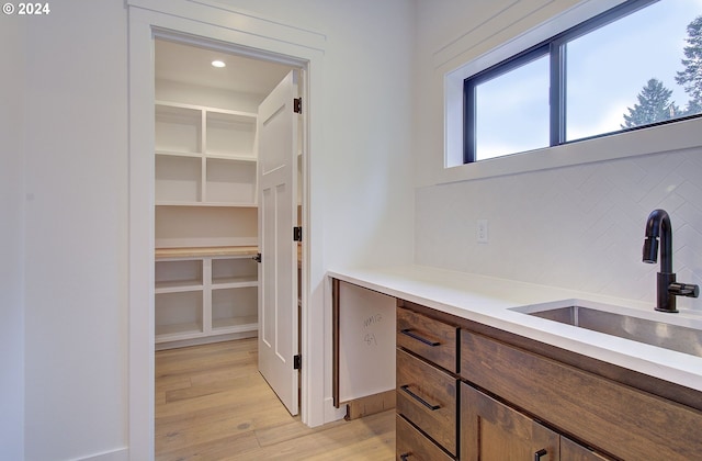 interior space featuring light hardwood / wood-style flooring and sink