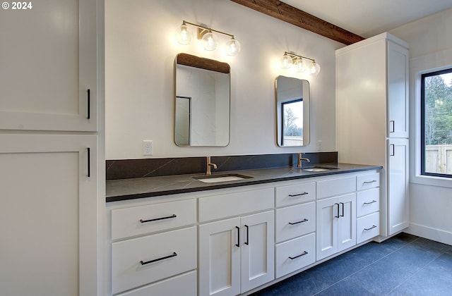 bathroom featuring vanity and tile patterned floors