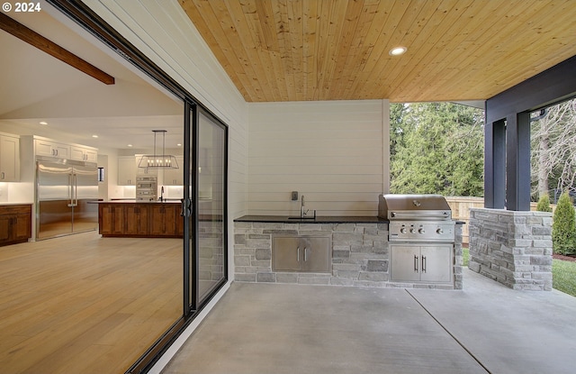 view of patio with grilling area and exterior kitchen