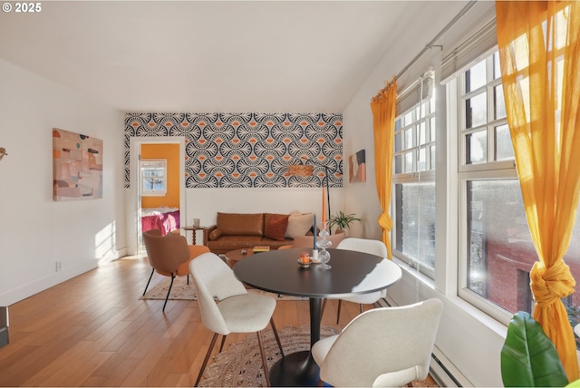 dining room with hardwood / wood-style floors