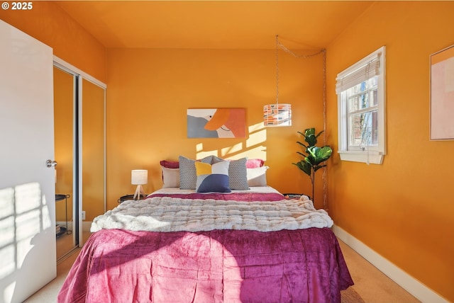 bedroom featuring carpet floors and a closet