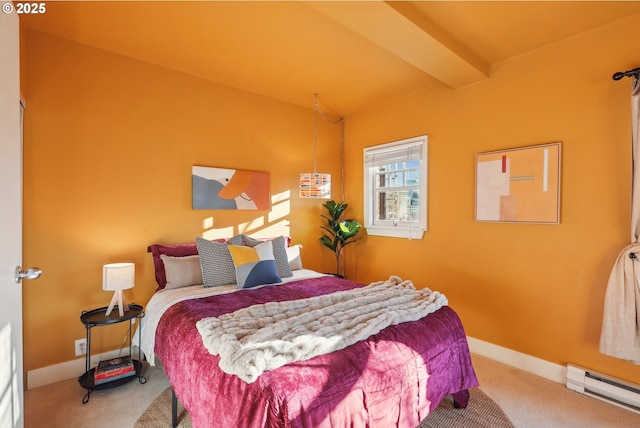 carpeted bedroom with beam ceiling and a baseboard heating unit