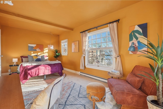 bedroom featuring baseboard heating and beamed ceiling