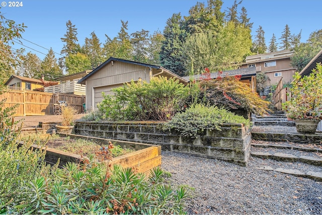 view of yard with a garage