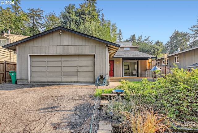 ranch-style home with a garage