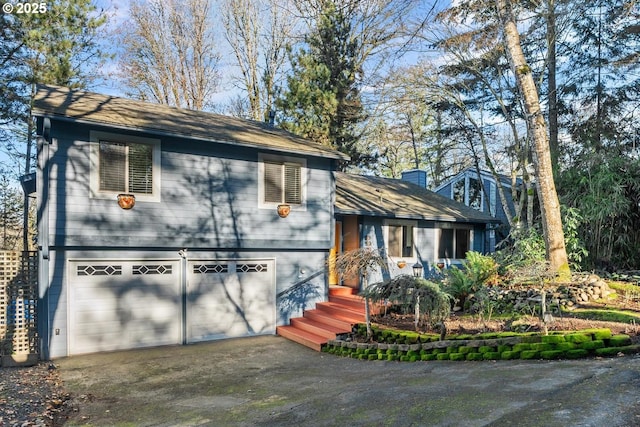 split level home with a garage