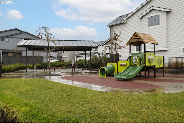 view of play area featuring a lawn