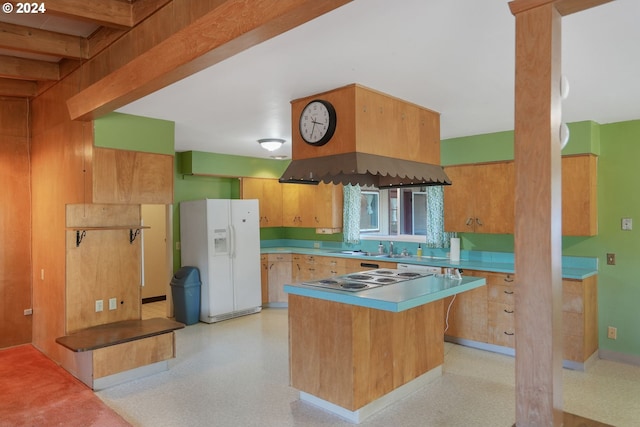 kitchen with beamed ceiling, ventilation hood, kitchen peninsula, white appliances, and a breakfast bar