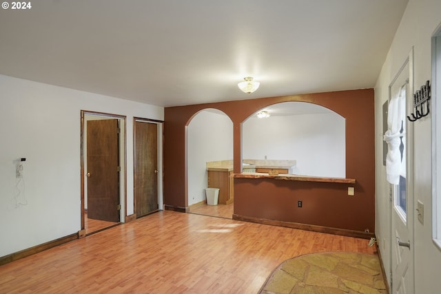 empty room with wood-type flooring