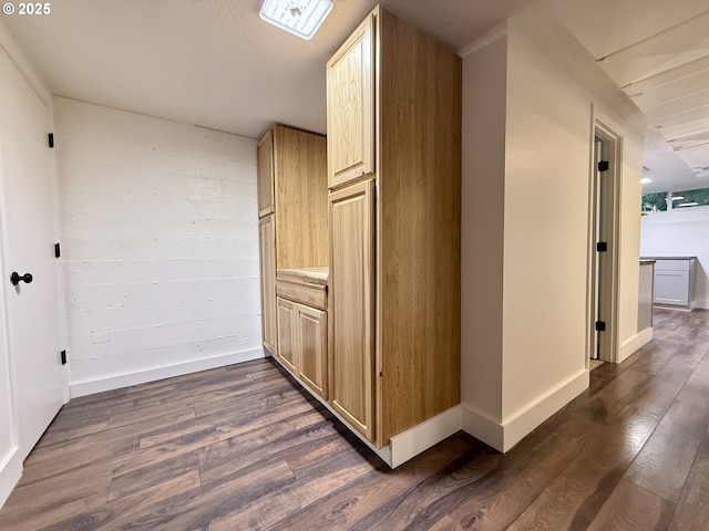 corridor featuring dark hardwood / wood-style floors