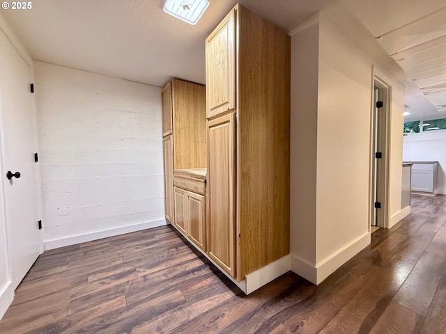 hall with dark hardwood / wood-style flooring