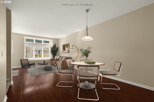 dining room featuring dark hardwood / wood-style floors