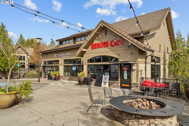 exterior space featuring a fire pit