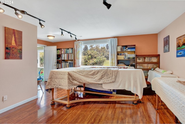 bedroom featuring hardwood / wood-style flooring