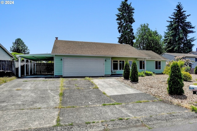 ranch-style house featuring a carport