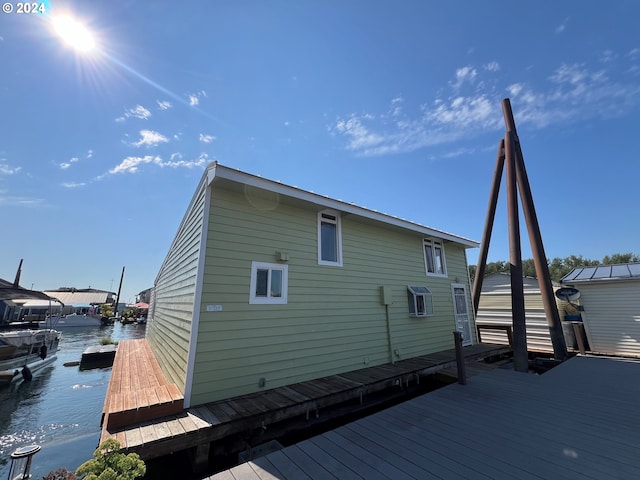 rear view of house with a water view