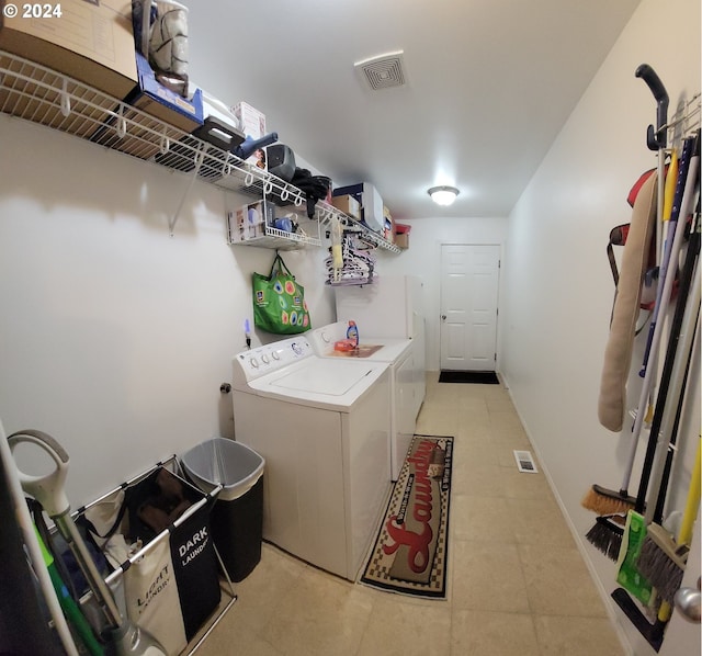 laundry room with washing machine and dryer