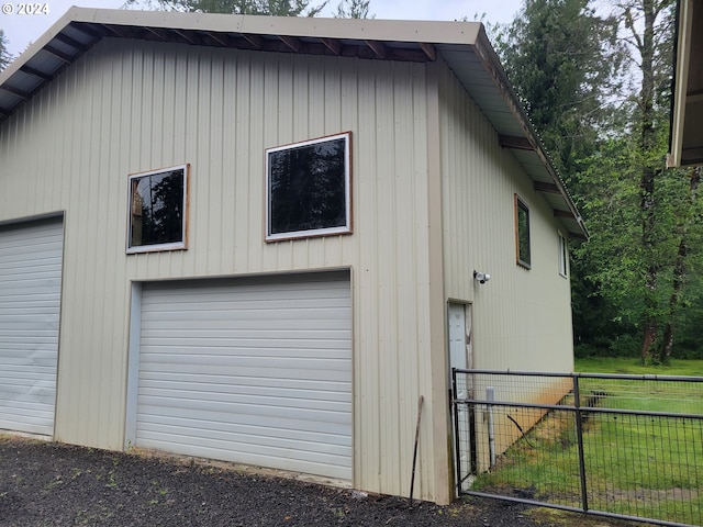 view of home's exterior with fence