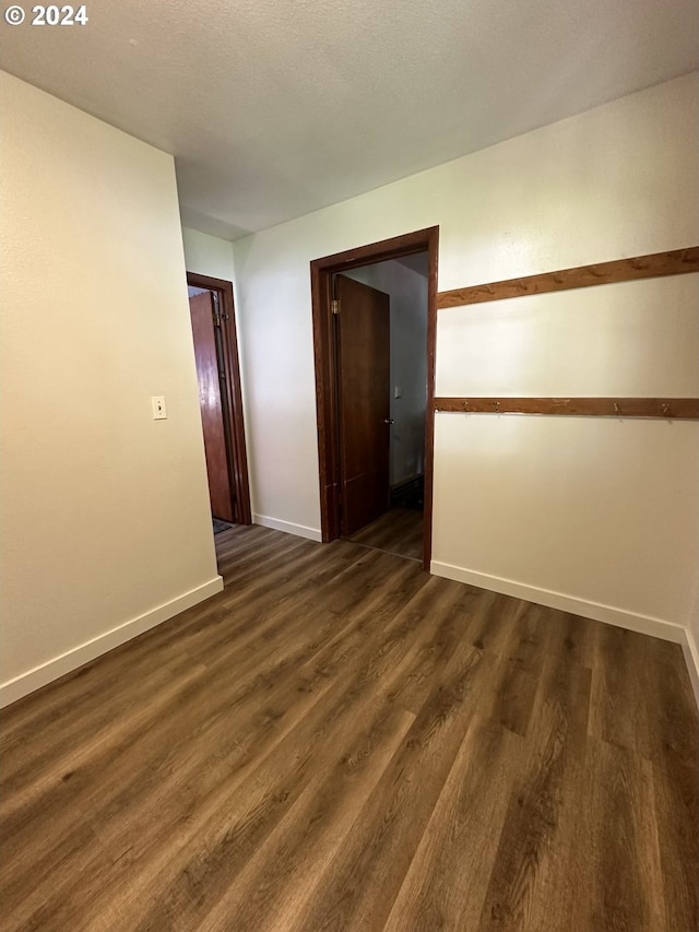 46791 Winfrey Rd, Westfir, OR 97492 - empty room with dark wood-type flooring and baseboards