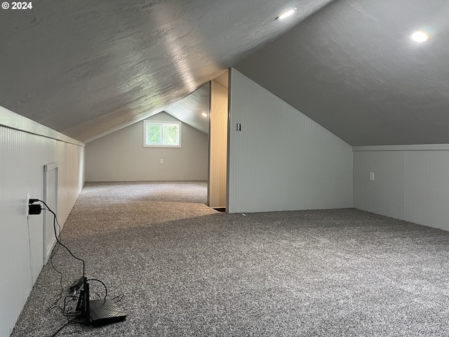 46791 Winfrey Rd, Westfir, OR 97492 - additional living space featuring lofted ceiling, carpet floors, and wooden walls