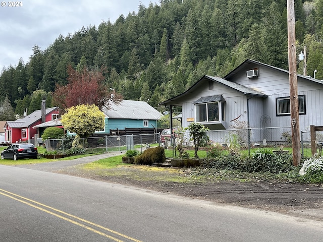46791 Winfrey Rd, Westfir, OR 97492 - view of front of property featuring a view of trees, driveway, and board and batten siding