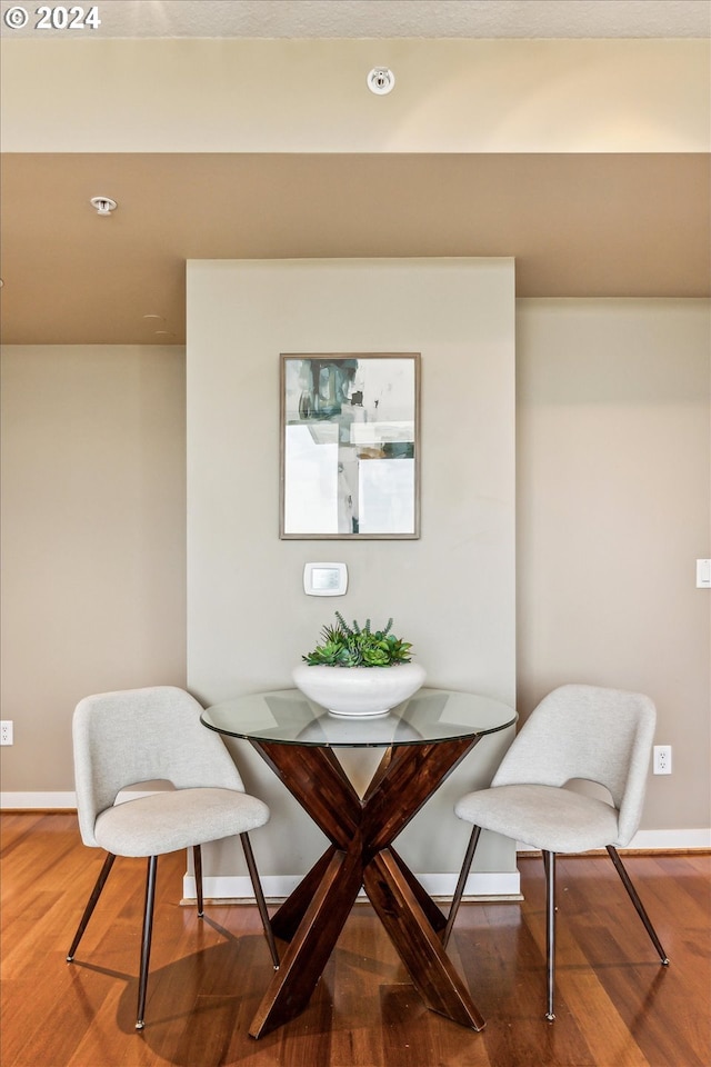 dining area featuring hardwood / wood-style floors