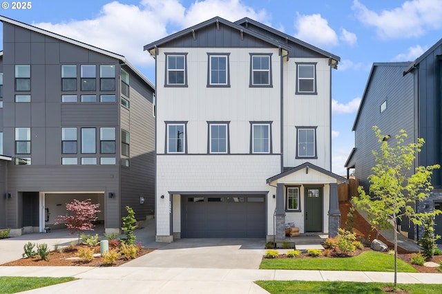 15044 SW 164th Ave Unit L17, Tigard, OR 97224 - view of front of home featuring a garage, driveway, and board and batten siding