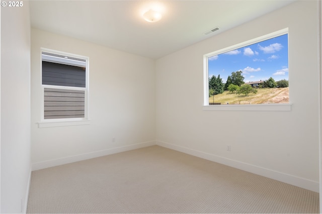 15044 SW 164th Ave Unit L17, Tigard, OR 97224 - carpeted spare room featuring baseboards