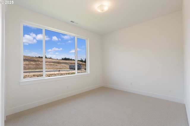 15044 SW 164th Ave Unit L17, Tigard, OR 97224 - carpeted empty room with baseboards
