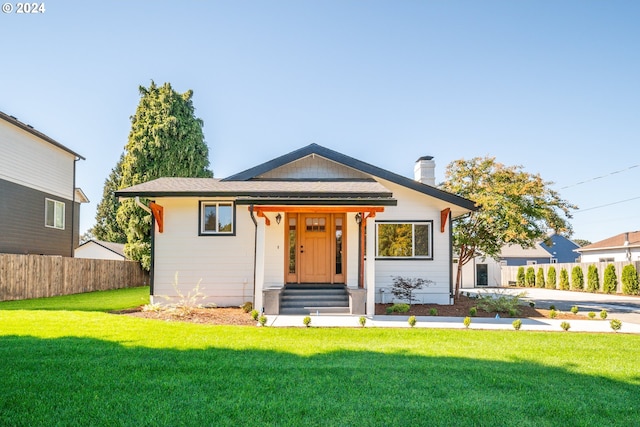 view of front of house with a front yard