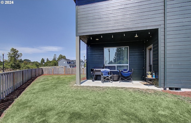 view of yard with a patio area