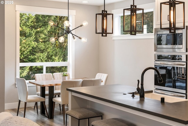 dining room featuring light hardwood / wood-style floors