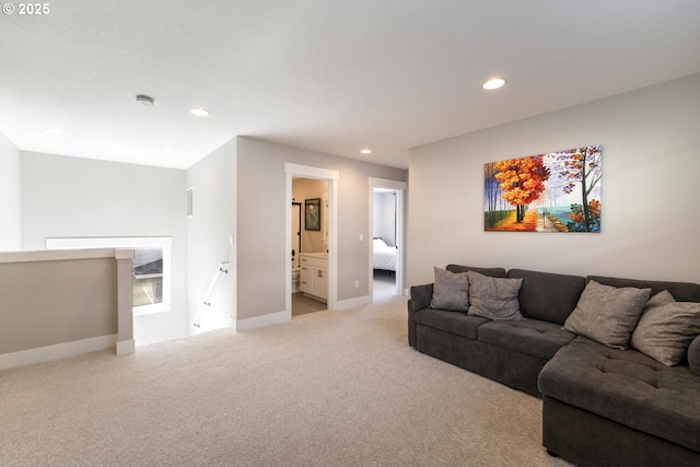 living room featuring light carpet