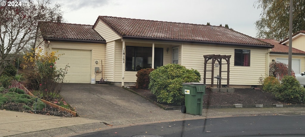 view of front of property with a garage