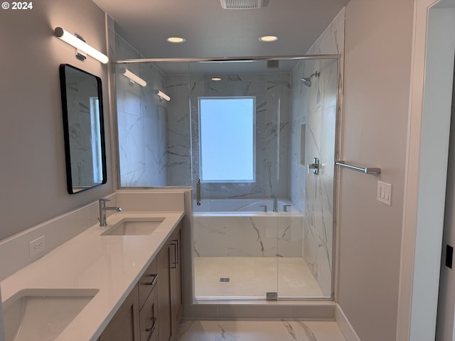 bathroom featuring vanity and plus walk in shower