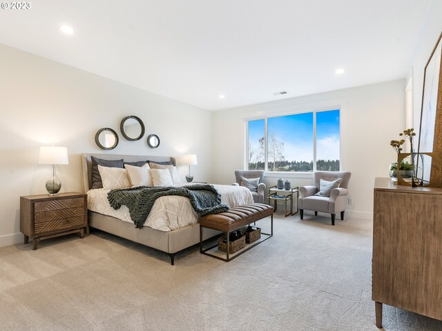 bedroom with light carpet