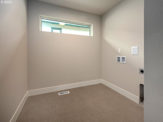 clothes washing area featuring carpet, washer hookup, and hookup for an electric dryer