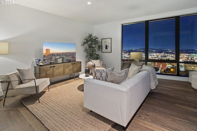 living area with recessed lighting and wood finished floors