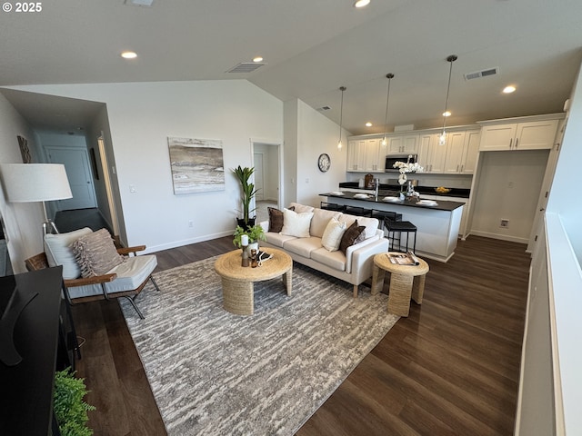 living room featuring recessed lighting, visible vents, baseboards, and dark wood-style flooring