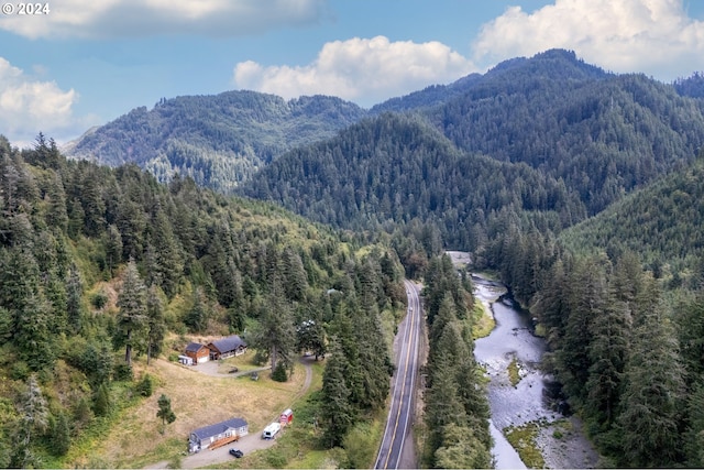 drone / aerial view featuring a mountain view