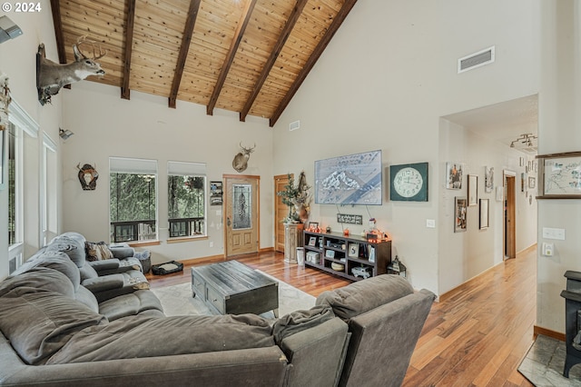 living room with wooden ceiling, high vaulted ceiling, light hardwood / wood-style flooring, and beam ceiling