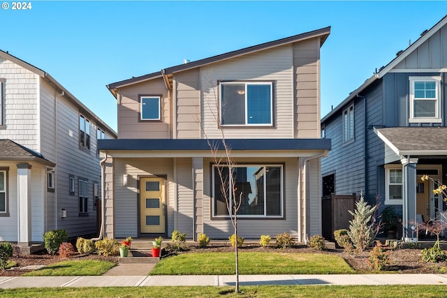 view of front of home featuring a front lawn