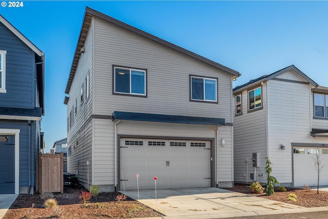 view of front of home with a garage